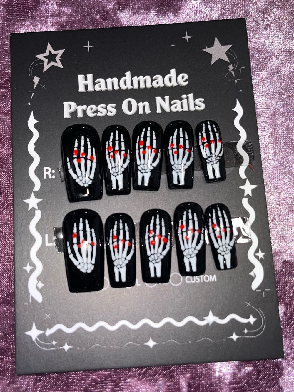 Black Skeleton Press-On Nails with Red Accent
